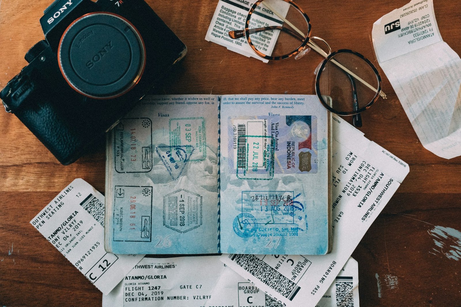 Documents and passport on a desk, representing Spain visa paperwork