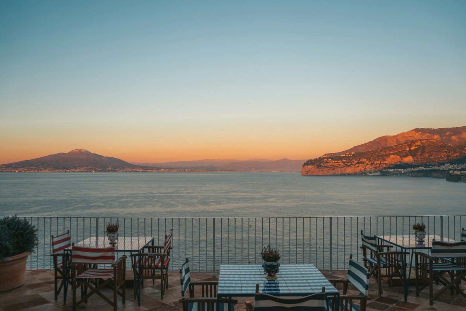 Golden-hour view across a Spanish Mediterranean terrace, the kind of everyday scene families relocating to Europe are choosing